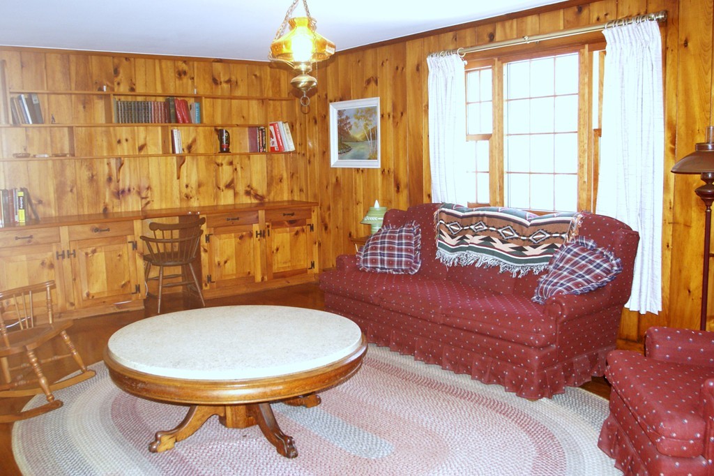 187-191 Shepard Road Sturbridge, MA 01566 - Photo 6 of 18 a living room with furniture and a blue