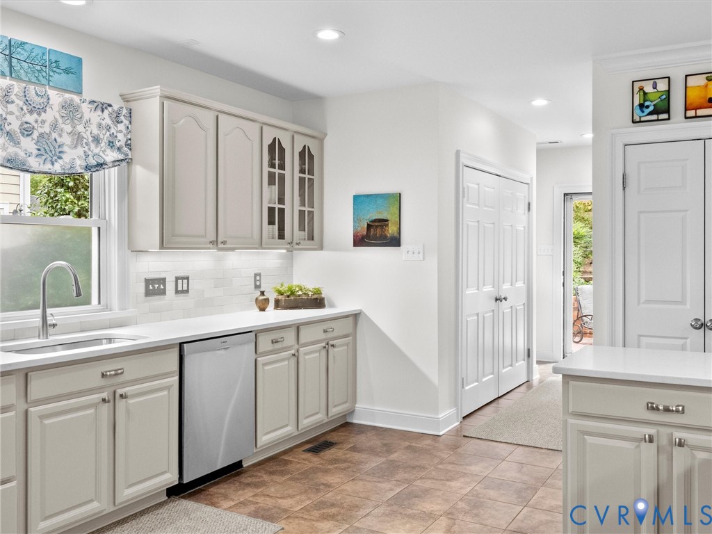 7723 Stuart Hall Road Henrico, VA 23229 - Photo 21 of 42 Kitchen featuring light-toned cabinetry, white cou