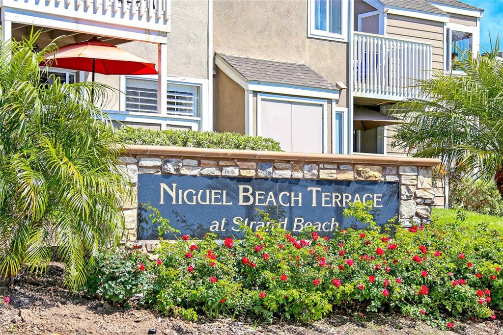 34028 Selva Road, Unit 77 Dana Point, CA 92629 - Photo 4 of 62 a sign on the side of a building