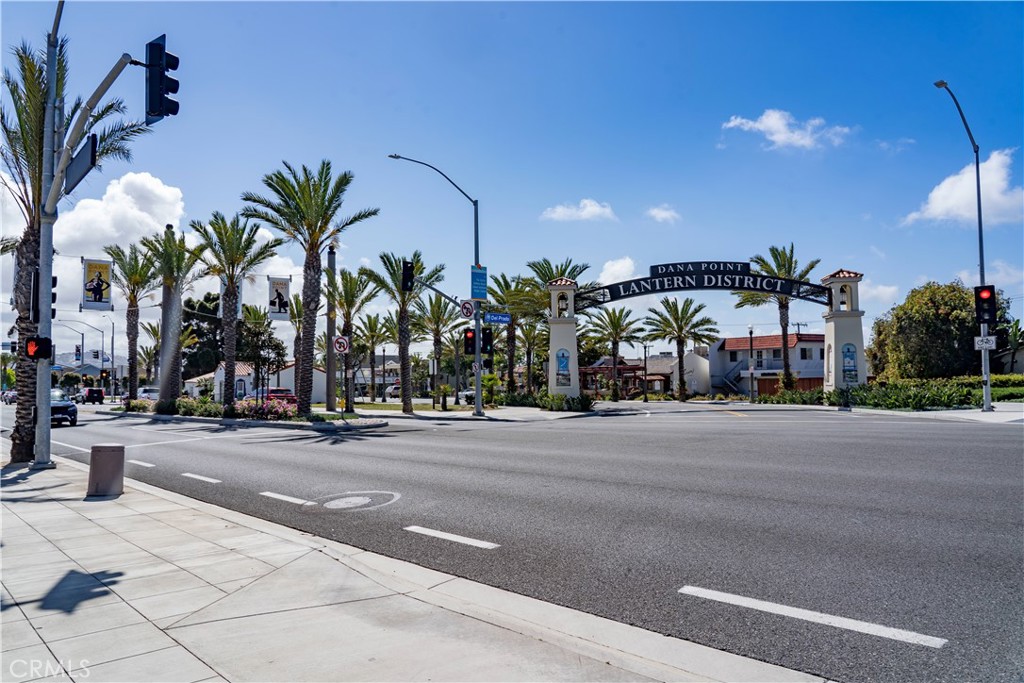 34028 Selva Road, Unit 77 Dana Point, CA 92629 - Photo 48 of 62 a building with palm trees in front of it