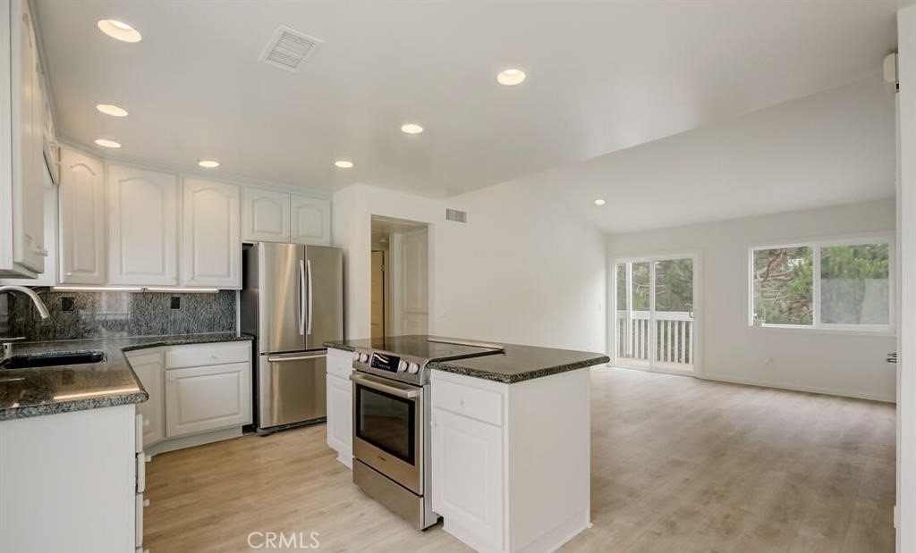 34028 Selva Road, Unit 77 Dana Point, CA 92629 - Photo 7 of 62 Light, bright, coastal modern vibes - BRAND NEW LVP flooring just installed + baseboards + fresh interior paint