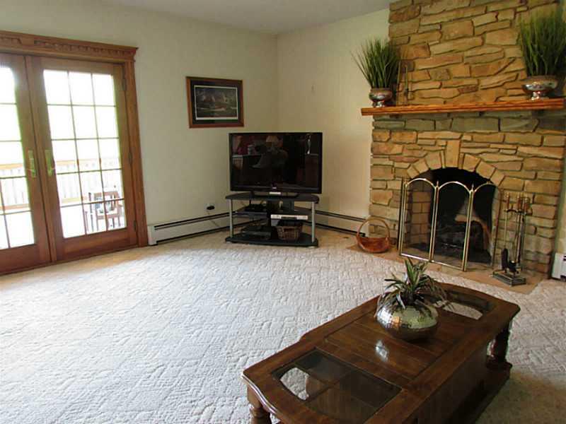 130 Craft Road Washington, PA 15301 - Photo 12 of 25 Family Room. Open to the kitchen, the Family Room has a gas fireplace and access to the private deck.