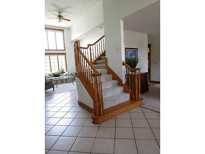 130 Craft Road Washington, PA 15301 - Photo 3 of 25 Entry/Foyer. Impressive custom oak staircase in the 2 story foyer