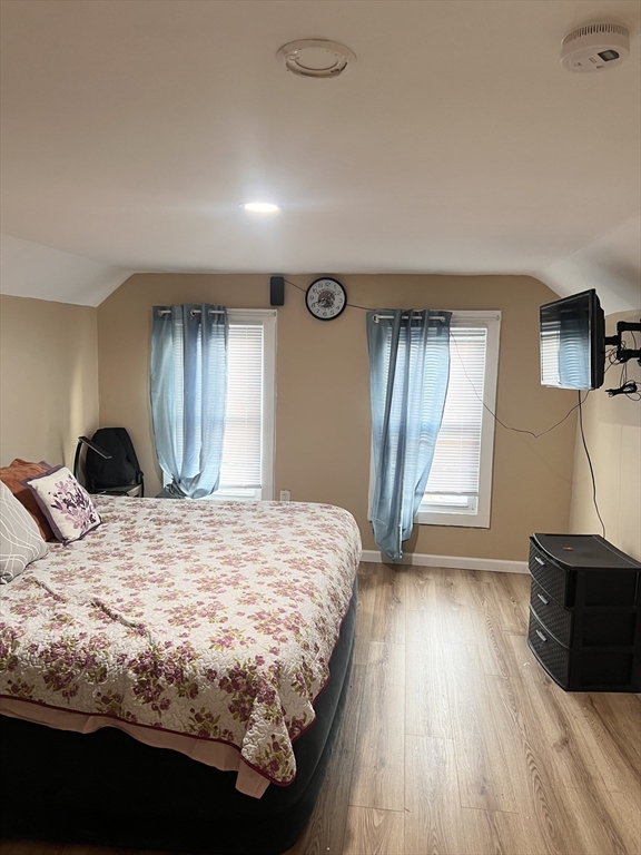 18 Greenacre Square Springfield, MA 01105 - Photo 12 of 22 a bedroom with a bed and a television