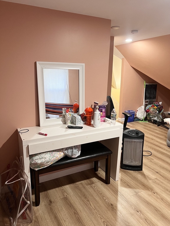 18 Greenacre Square Springfield, MA 01105 - Photo 13 of 22 a room with a table chairs and wooden floor