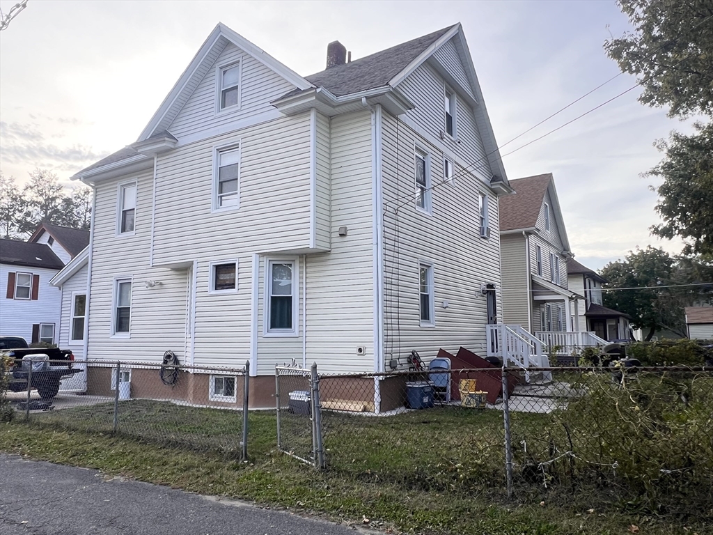18 Greenacre Square Springfield, MA 01105 - Photo 18 of 22 a view of a house with a backyard