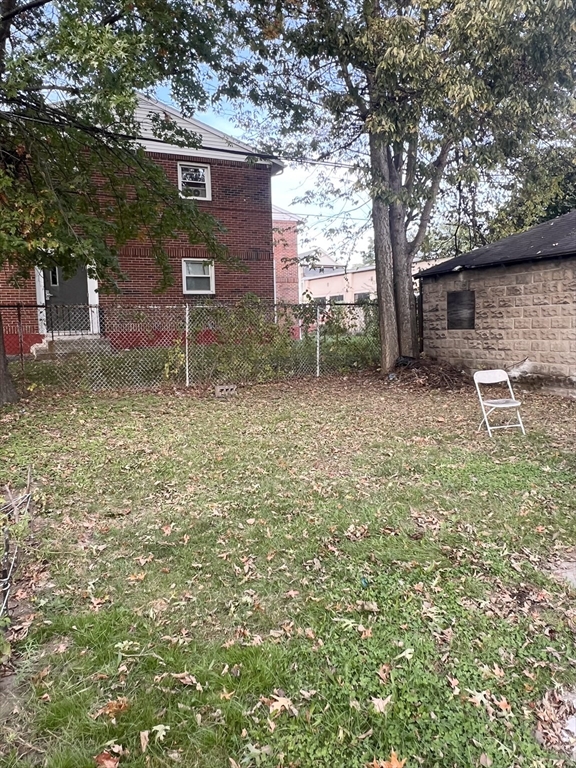 18 Greenacre Square Springfield, MA 01105 - Photo 22 of 22 a backyard of a house with seating space