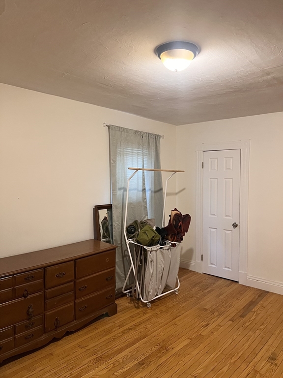 18 Greenacre Square Springfield, MA 01105 - Photo 9 of 22 a room with furniture and wooden floor