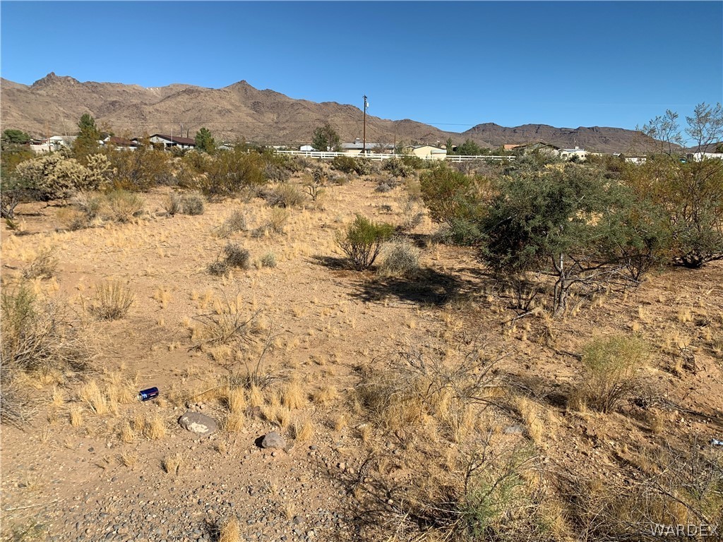 Tbd Bosque Road Golden Valley, AZ 86413 - Photo 8 of 9 a view of a dry yard with mountains in the background