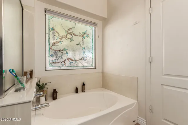 a bathroom with a sink and a tub