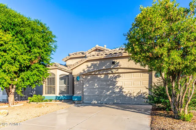 a view of a building with a street
