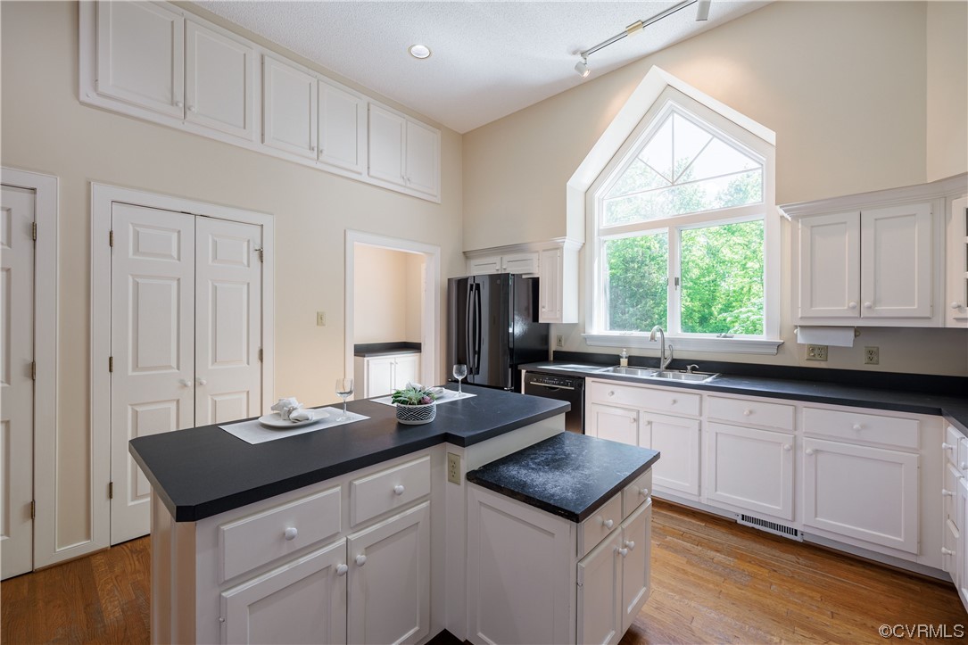 380 Ziontown Road Henrico, VA 23229 - Photo 17 of 44 a kitchen with granite countertop a sink cabinets and window