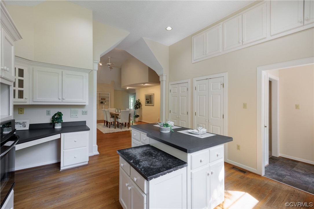 380 Ziontown Road Henrico, VA 23229 - Photo 18 of 44 a kitchen with granite countertop stove top oven and cabinets
