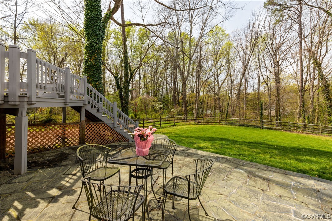 380 Ziontown Road Henrico, VA 23229 - Photo 3 of 44 a view of backyard with table and chairs and a barbeque