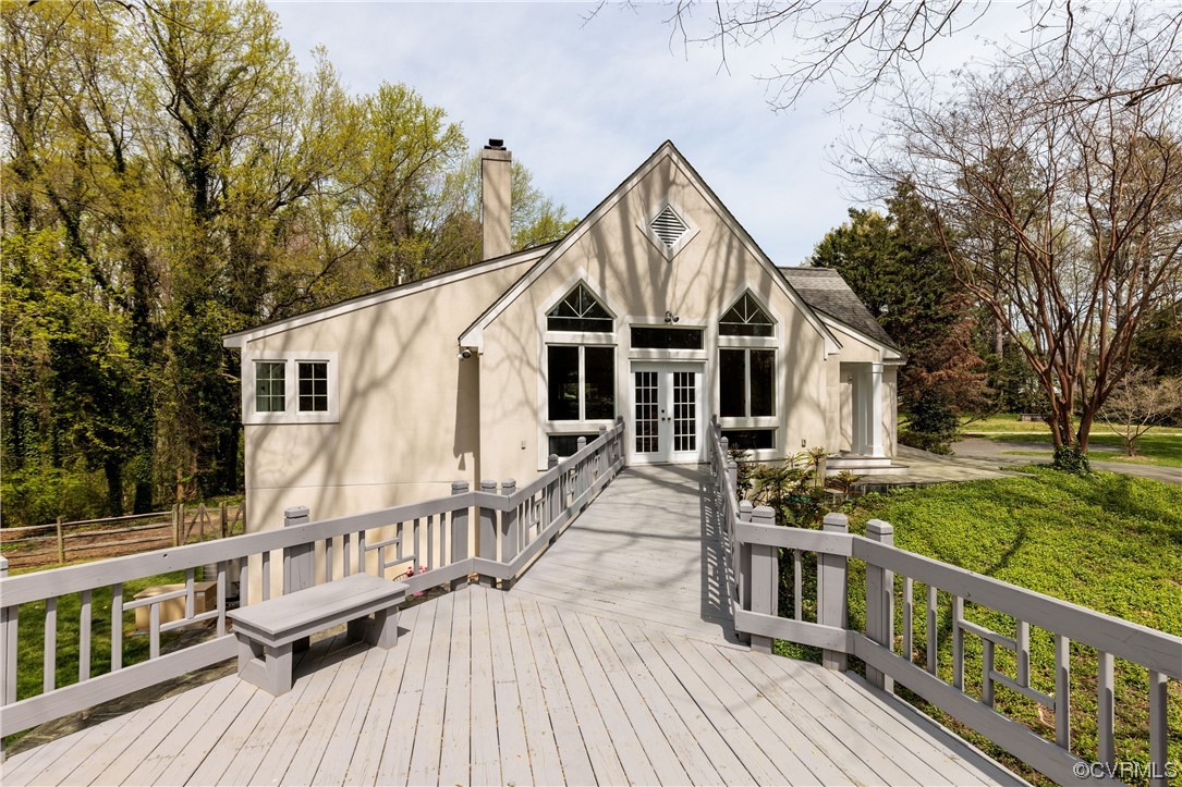 380 Ziontown Road Henrico, VA 23229 - Photo 36 of 44 a view of a wooden deck and trees with wooden fence