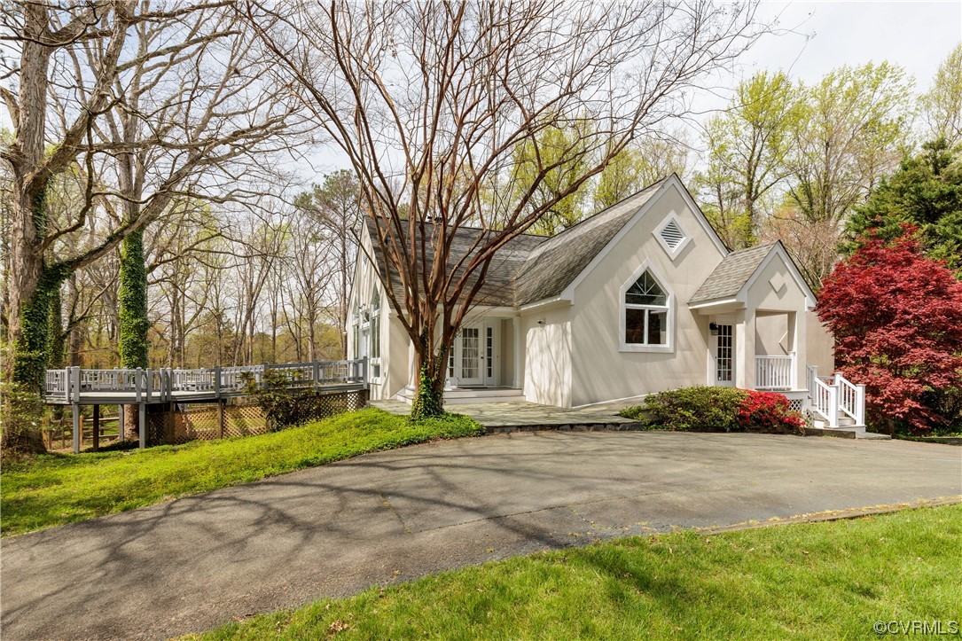 380 Ziontown Road Henrico, VA 23229 - Photo 38 of 44 a white house that has a tree in front of it