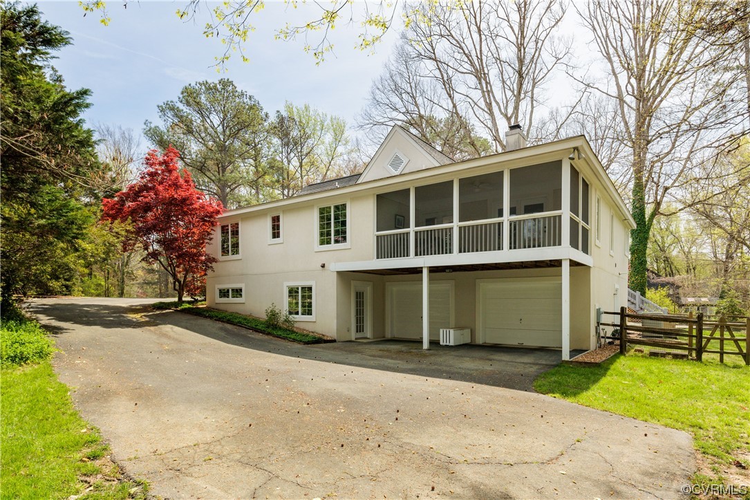 380 Ziontown Road Henrico, VA 23229 - Photo 41 of 44 a front view of a house with a yard and garage