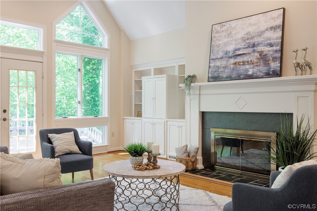380 Ziontown Road Henrico, VA 23229 - Photo 7 of 44 a living room with furniture and a fireplace