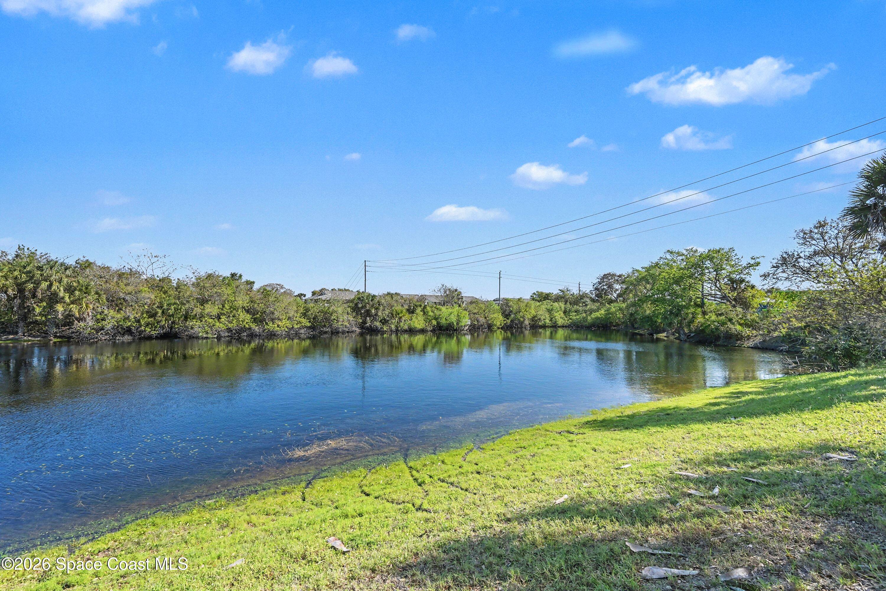 100 Turpial Way, Unit 108 Melbourne, FL 32901 - Photo 4 of 26 View from outside of unit side