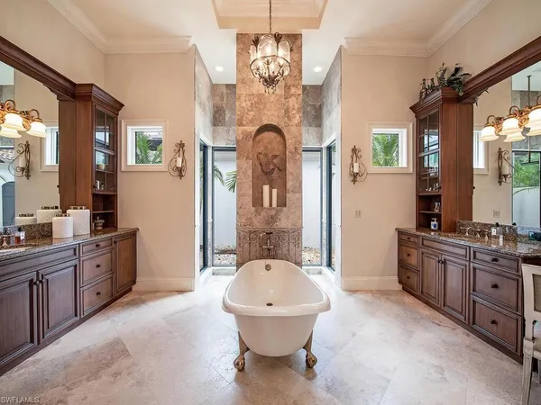 a very nice looking dining room with wooden floor and a window