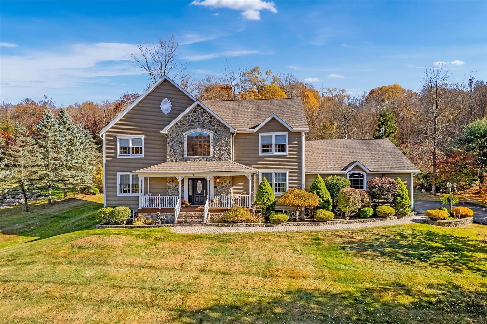 4 Sutherland Drive Highland Mills, NY 10930 - Photo 1 of 1 a front view of a house with a big yard