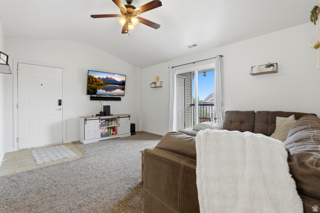 8083 North Ridge Loop East, Unit I 9 Eagle Mountain, UT 84005 - Photo 4 of 17 Living room featuring a ceiling fan, carpet floors, and vaulted ceiling