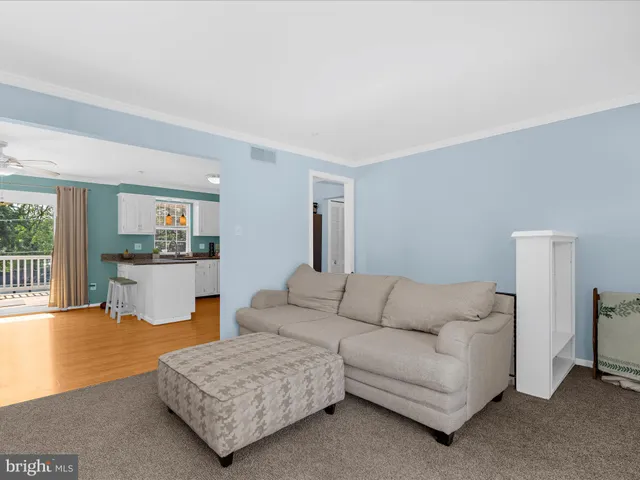 a view of a balcony with wooden floor