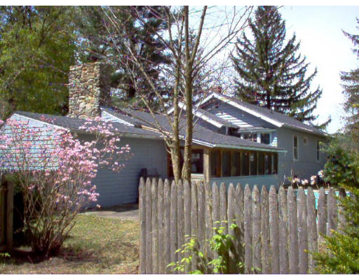 121 Palmer Road Monson, MA 01057 - Photo 4 of 10 a view of a house with a yard