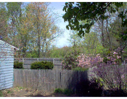 121 Palmer Road Monson, MA 01057 - Photo 8 of 10 a view of a wooden fence