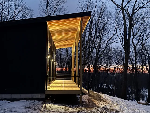 a view of a lounge chair in the backyard