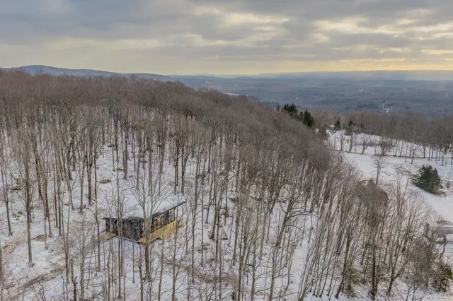 a view of a backyard of the house