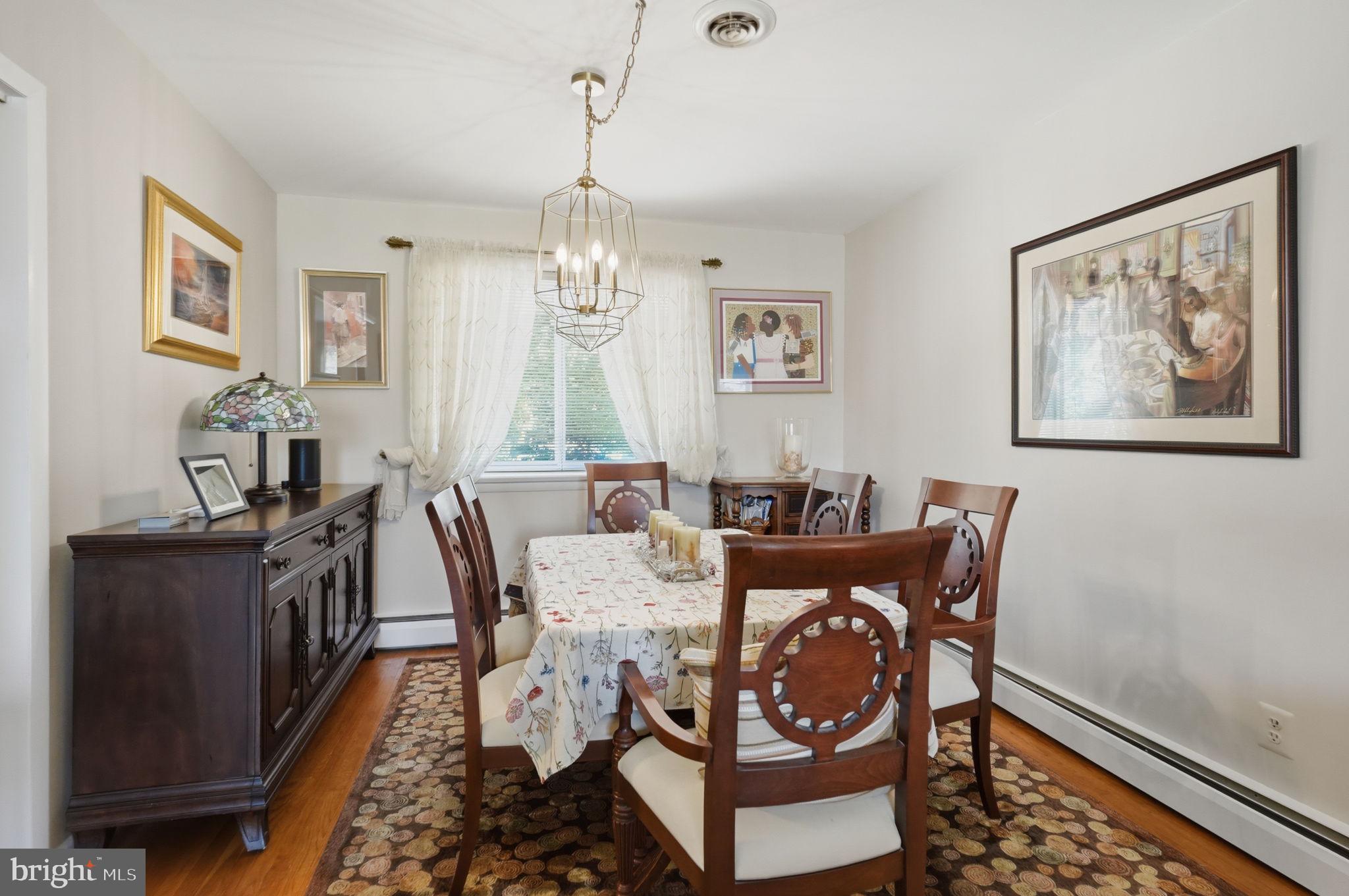 318 Warwick Road Lawnside, NJ 08045 - Photo 8 of 25 Charming dining space with natural light.