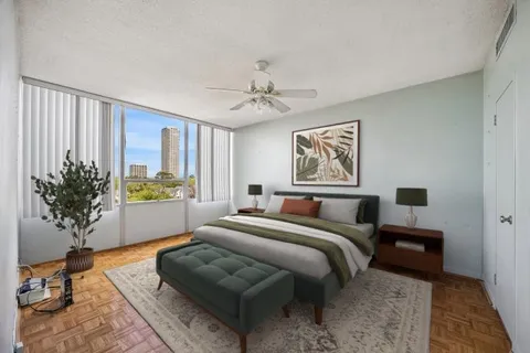 a bed room with a bed and a couch