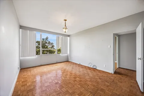 a view of an empty room with a window