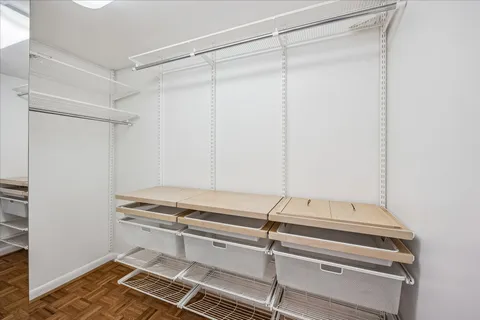 a view of room with racks on the wall