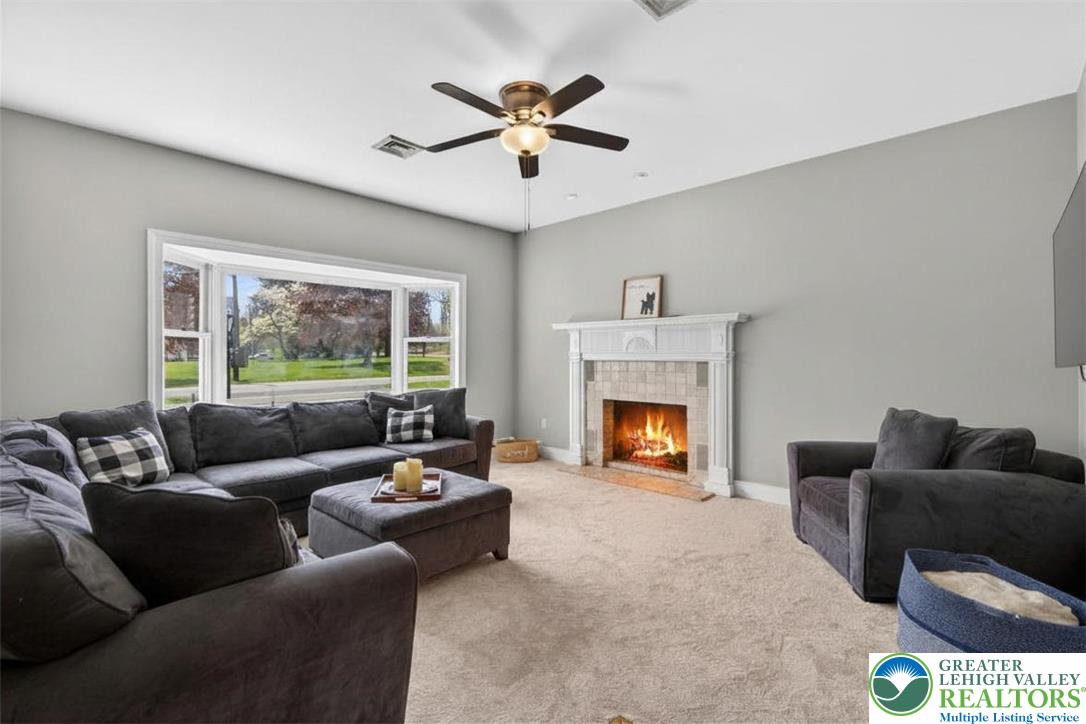 5255 Landis Mill Road Bethlehem, PA 18015 - Photo 17 of 50 a living room with furniture and a fireplace