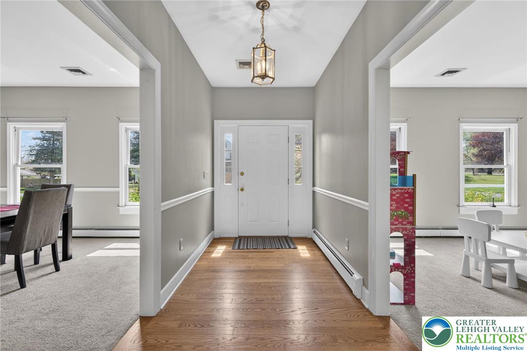5255 Landis Mill Road Bethlehem, PA 18015 - Photo 4 of 50 a view of a hallway view with wooden floor and furniture