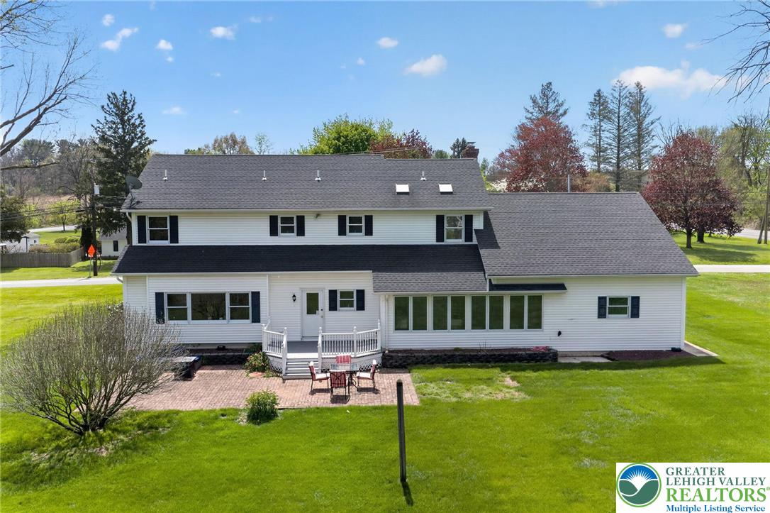 5255 Landis Mill Road Bethlehem, PA 18015 - Photo 41 of 50 a view of a house with a patio and a yard
