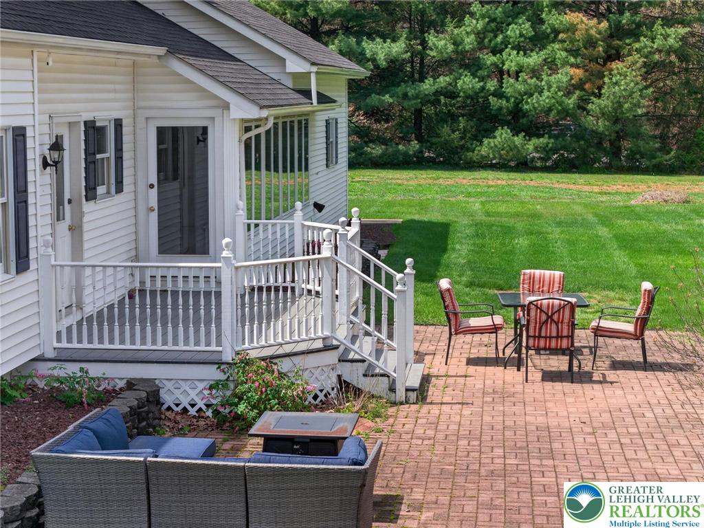 5255 Landis Mill Road Bethlehem, PA 18015 - Photo 43 of 50 a view of a house with backyard sitting area and garden