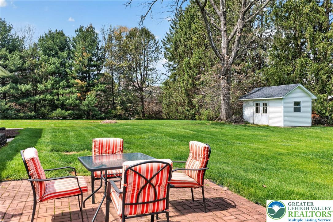 5255 Landis Mill Road Bethlehem, PA 18015 - Photo 44 of 50 a view of a chair and table on the green field