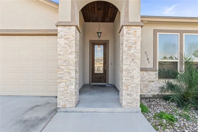 a view of entryway with a front door