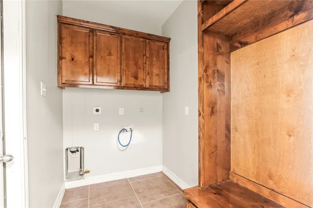 a view of a kitchen with a sink and a ceiling fan