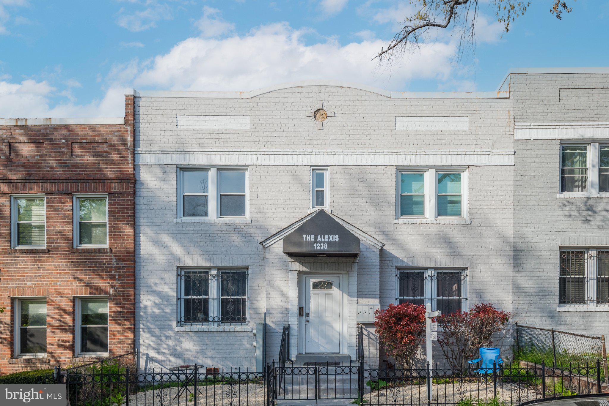 1238 Queen Street Northeast, Unit 3 Washington, DC 20002 - Photo 1 of 15 Charming brick-fronted apartment building.
