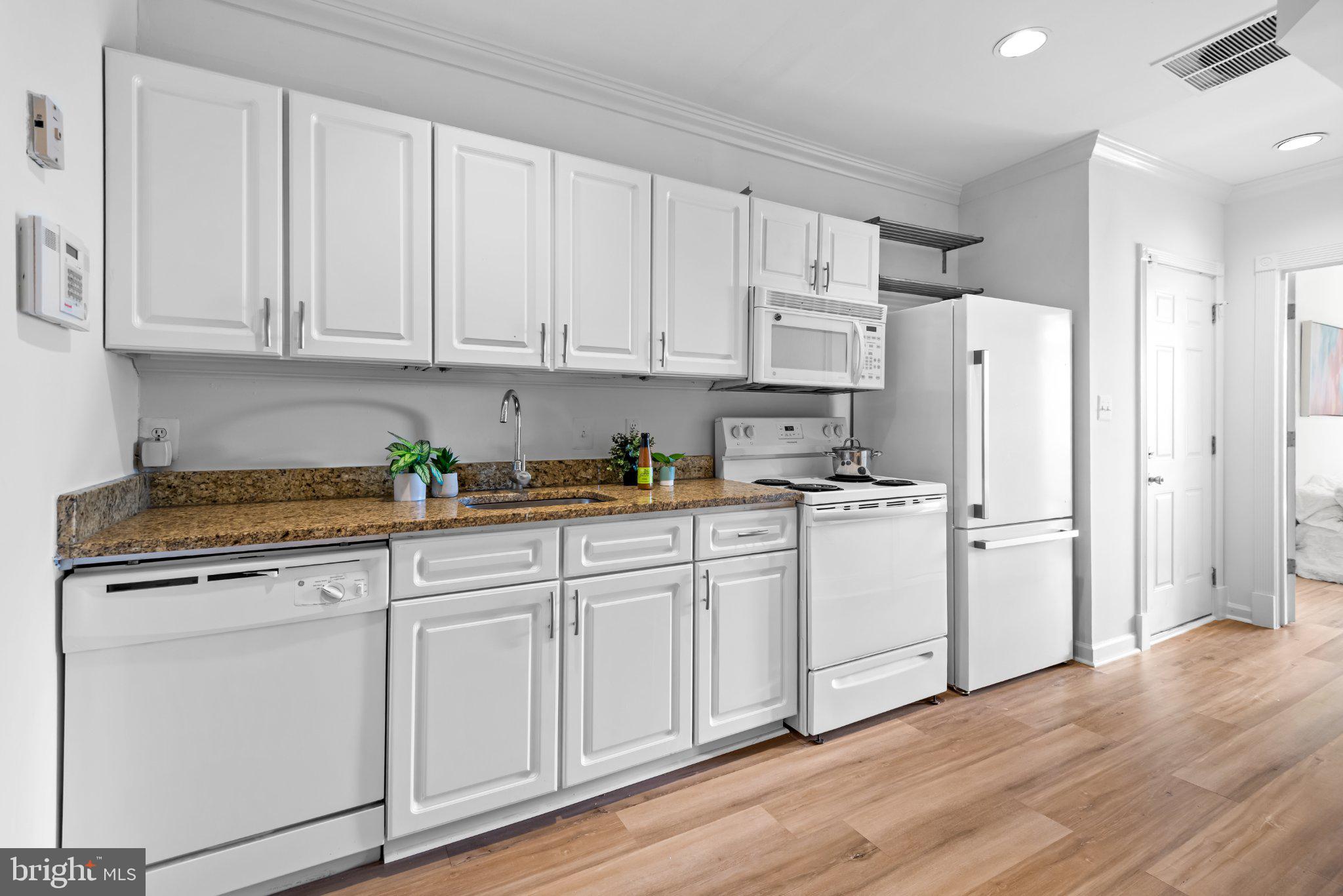 1238 Queen Street Northeast, Unit 3 Washington, DC 20002 - Photo 7 of 15 Modern kitchen with sleek finishes.