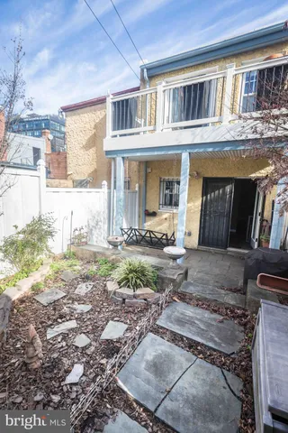 a view of a building with a street
