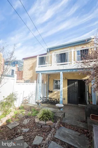 a view of a building with a street