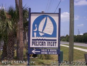 7175 A1A South, Unit E130 St. Augustine, FL 32080 - Photo 1 of 21 a sign on the side of a building