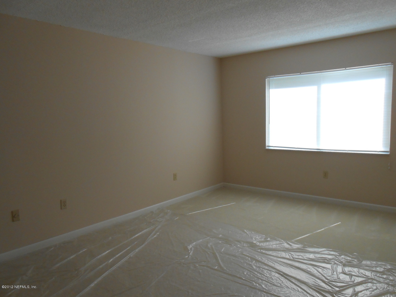 7175 A1A South, Unit E130 St. Augustine, FL 32080 - Photo 15 of 21 an empty room with a window