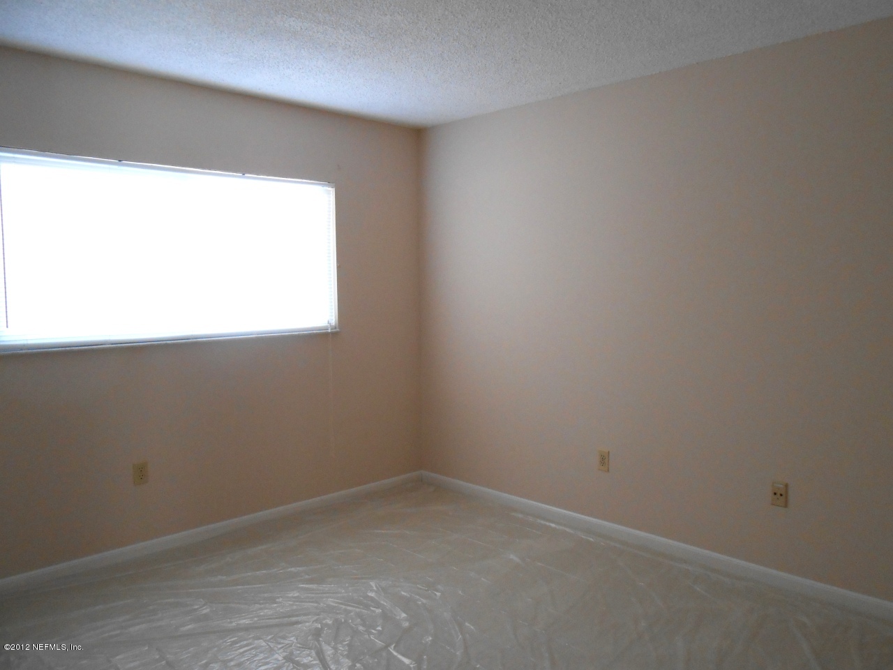 7175 A1A South, Unit E130 St. Augustine, FL 32080 - Photo 17 of 21 a room that has a window in it