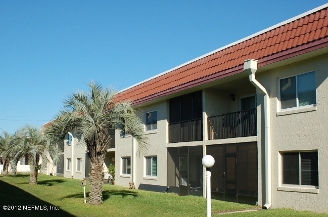 7175 A1A South, Unit E130 St. Augustine, FL 32080 - Photo 5 of 21 a view of house with yard